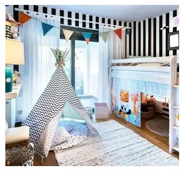 A room with two beds and a teepee.